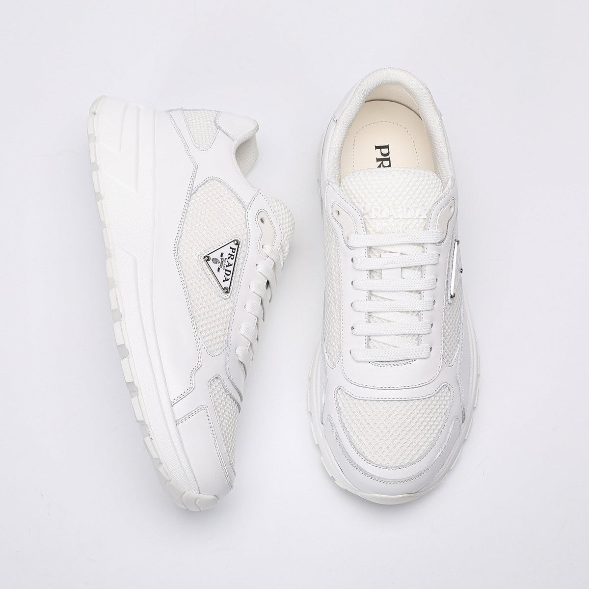 Prada White Leather Low-Top Sneakers — front