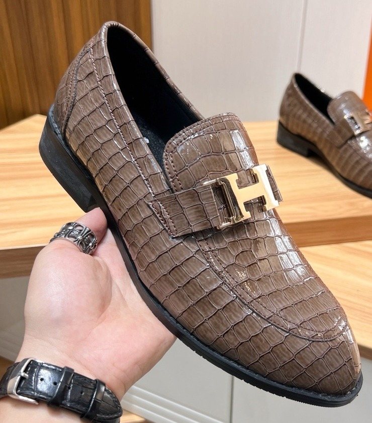 Hermès Brown Textured Loafers — front
