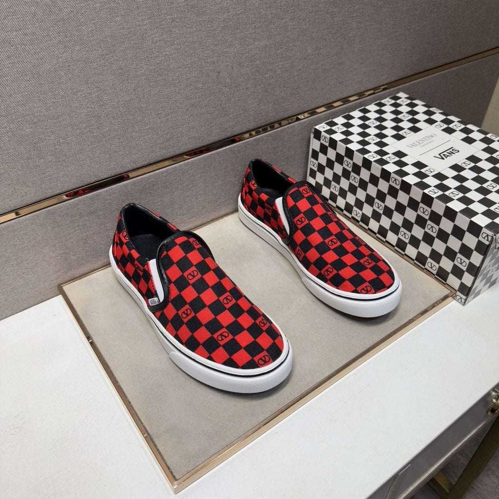 Vans Red and Black Checkerboard Slip-On Sneakers — hero