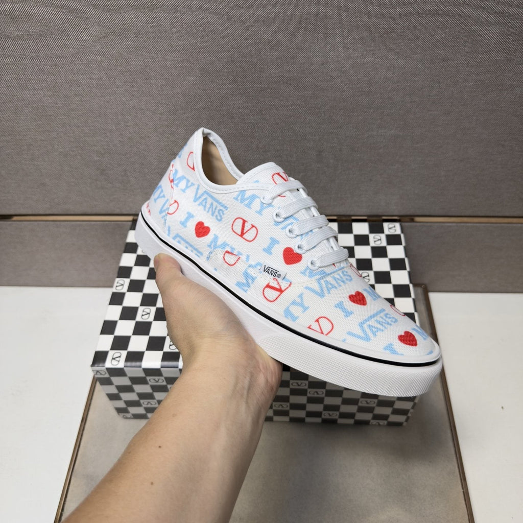 Vans White Graphic Low-Top Sneakers — model